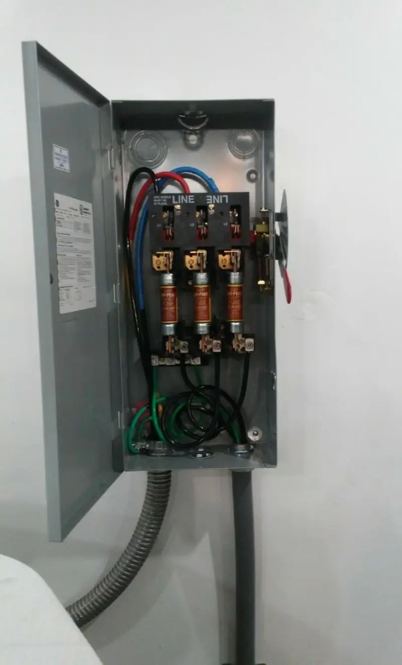 Three-phase disconnect switch installed for Smoke Detector Installation in Kimball