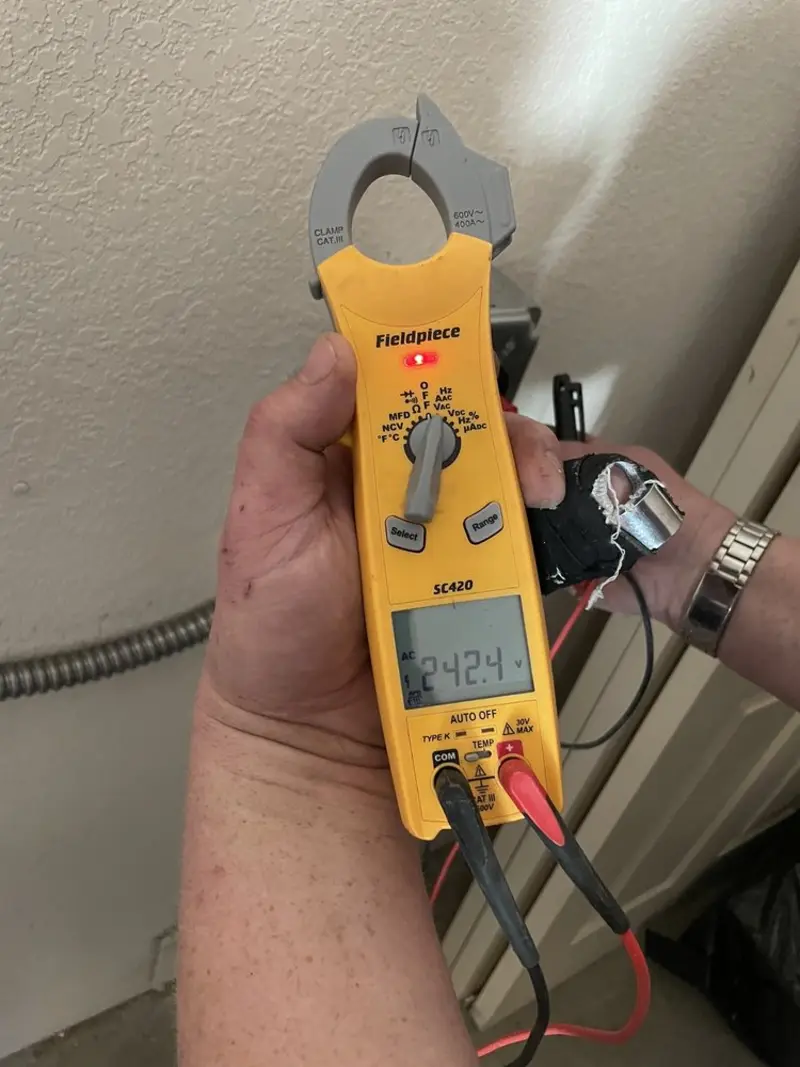 Voltage testing with clamp meter during Generator Installation in Kimball